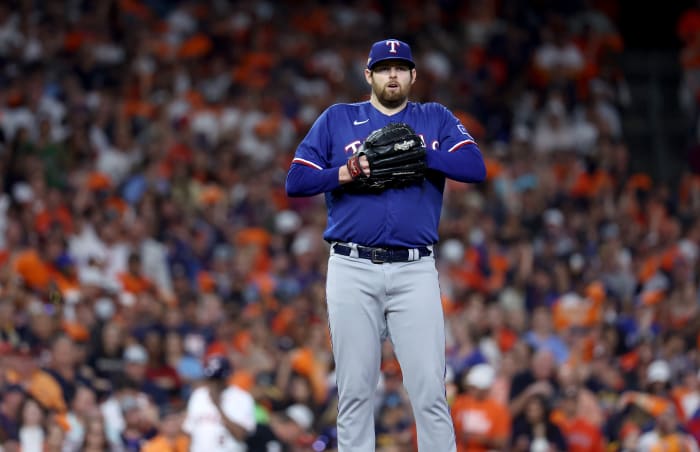 Oct 15, 2023; Houston, Texas, USA; Texas Rangers pitcher Jordan Montgomery (52) reacts after a walk during the third inning of game one of the ALCS against the Houston Astros in the 2023 MLB playoffs at Minute Maid Park. Mandatory Credit: Troy Taormina-USA TODAY Sports